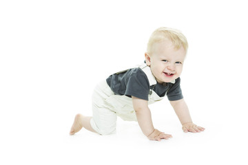 Cute baby with big blue eyes in denim on white background.