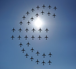 Airplane silhouettes in the sky
