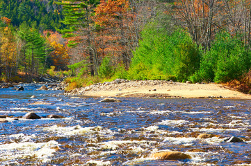 Obraz na płótnie Canvas Swift River at autumn