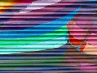 Mur peint : motif abstrait coloré en détail de graffiti