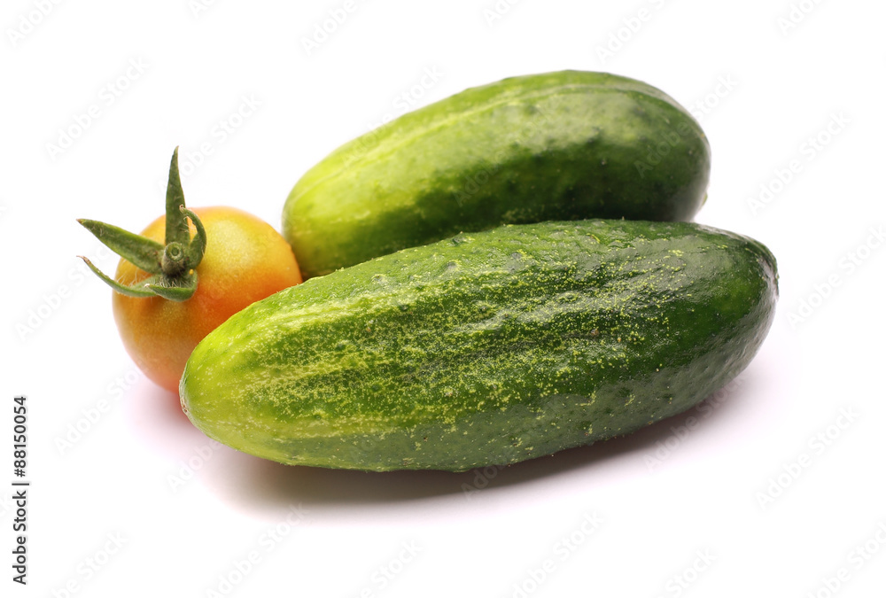 Wall mural cucumber and tomato on a white background