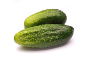 cucumber and tomato on a white background