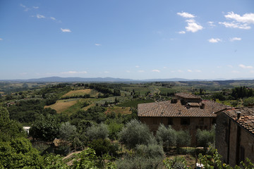 Obraz premium Toscana, Italien , Landschaft, San Gimignano, Türme, Zypressen, Olivenbäume, Hügellandschaft, Weinanbau, Altstadt, 
