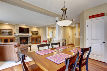 Simple dinning area with colorful place matts.