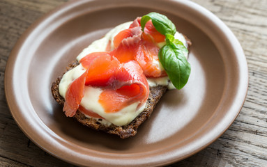 Sandwich with trout, mozzarella and tomatoes