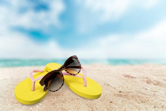 Flip-flop, Beach, Sunglasses.