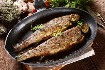 Fried trouts with rosemary