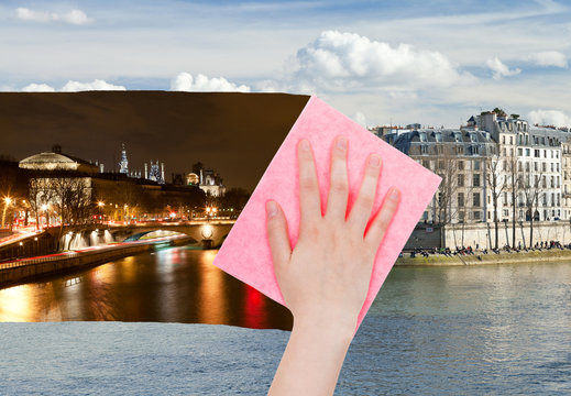 hand deletes night view of Paris by pink cloth