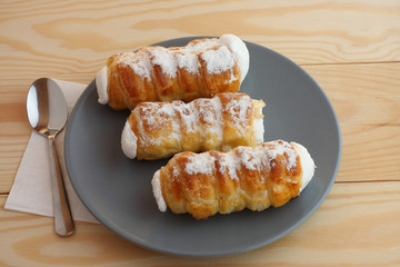 Sweet tubes filled egg white, Czech confection called Kremrole.