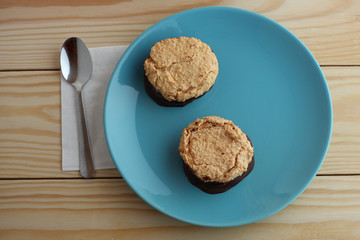  coconut cookies filled jam covered with chocolate