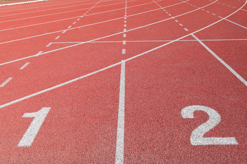 orange running Red track on background