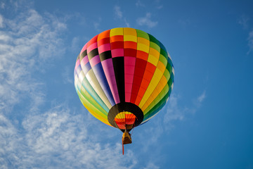 Colorful hot air balloons on the blue sky..