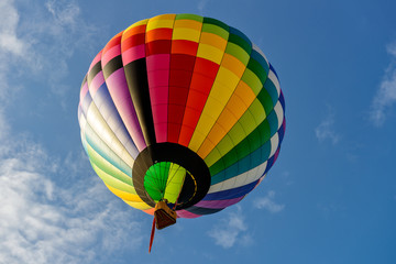 Colorful hot air balloons on the blue sky..