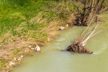 The tranquility of a quiet river in the countryside of the hills