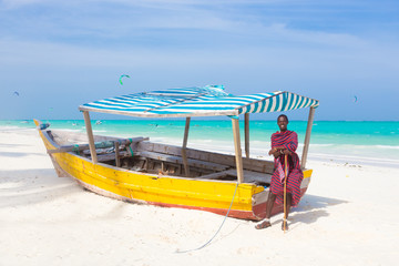 White tropical sandy beach on Zanzibar. - obrazy, fototapety, plakaty