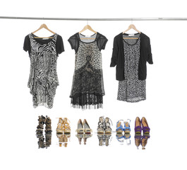 shirt and Variety of fashion female clothes hangers and shoes 