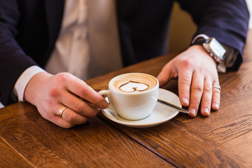 coffee cup in hands