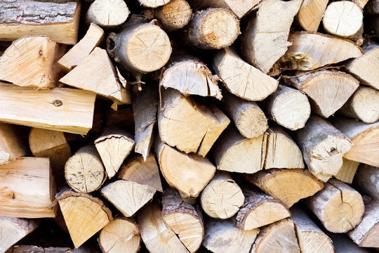 Fire wood background texture, firewood in a pile