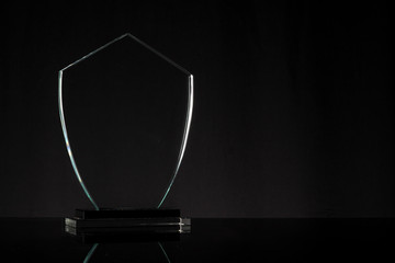 glass trophy in black background