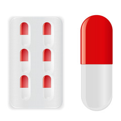 Pills in blister pack. Red capsules