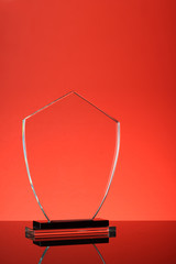 glass trophy in red background
