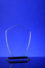 glass trophy in blue background