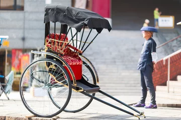 Deurstickers Japanese rickshaw man awaiting for the customers. Nagasaki © Yevgen Belich
