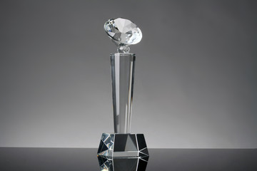glass trophy in gray background