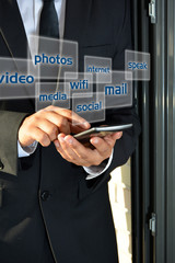 BUSINESSMAN USING YOUR SMARTPHONE