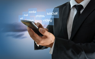 BUSINESSMAN USING YOUR SMARTPHONE