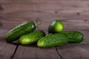 Fresh Cucumber on wooden table