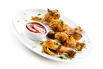 Grilled chicken drumsticks and vegetables 