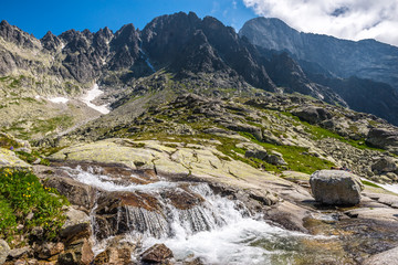 Summer mountain landscape. View on the Five Spiskie Lakes Valley (kotlina Piatich Spisskych plies) in High Tatra Mountains, Slovakia. - obrazy, fototapety, plakaty