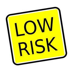 Low risk black stamp text on yellow background