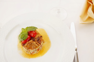 Restaurant meal/Delicious meat pie served in elegant restaurant. Traditional food. Very shallow depth of field for soft background