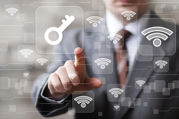 Social network WiFi businessman presses button web security key icon