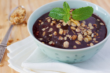 Brazilian dessert Acai pulp with muesli