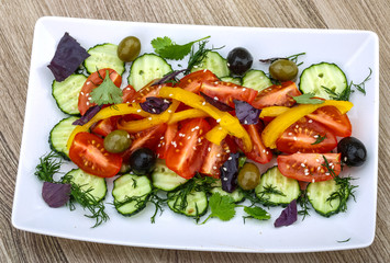 Salad with tomato, cucumber and olives