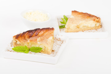 Tarte Aux Pommes - Apple pie served with cream.

