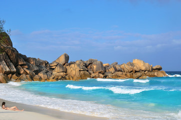 Warm evening at sandy beach during sunset. Seychelles, La Digue, Anse Cocos 