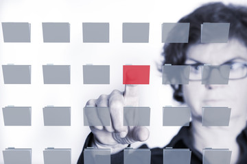 Woman typing on File Folder