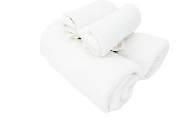 Rolled up white spa towels