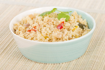 Couscous - Roasted vegetable couscous in a a bowl.
