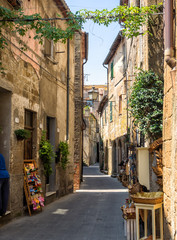 Pitigliano streets with old tuf homes, Italy - obrazy, fototapety, plakaty