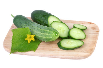 cucumber on cutting board isolated on white