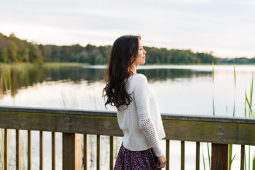 Happy young woman on nature walk