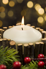 White candles in autumn winter decoration