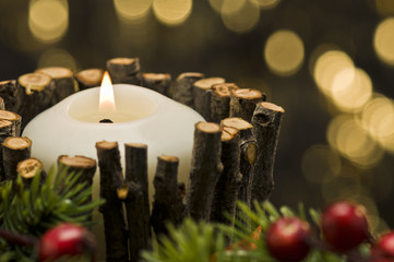 White candles in autumn winter decoration