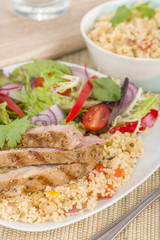 Grilled Pork & Couscous with Salad.
