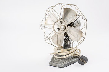 Obraz premium old vintage metal fan isolated on white